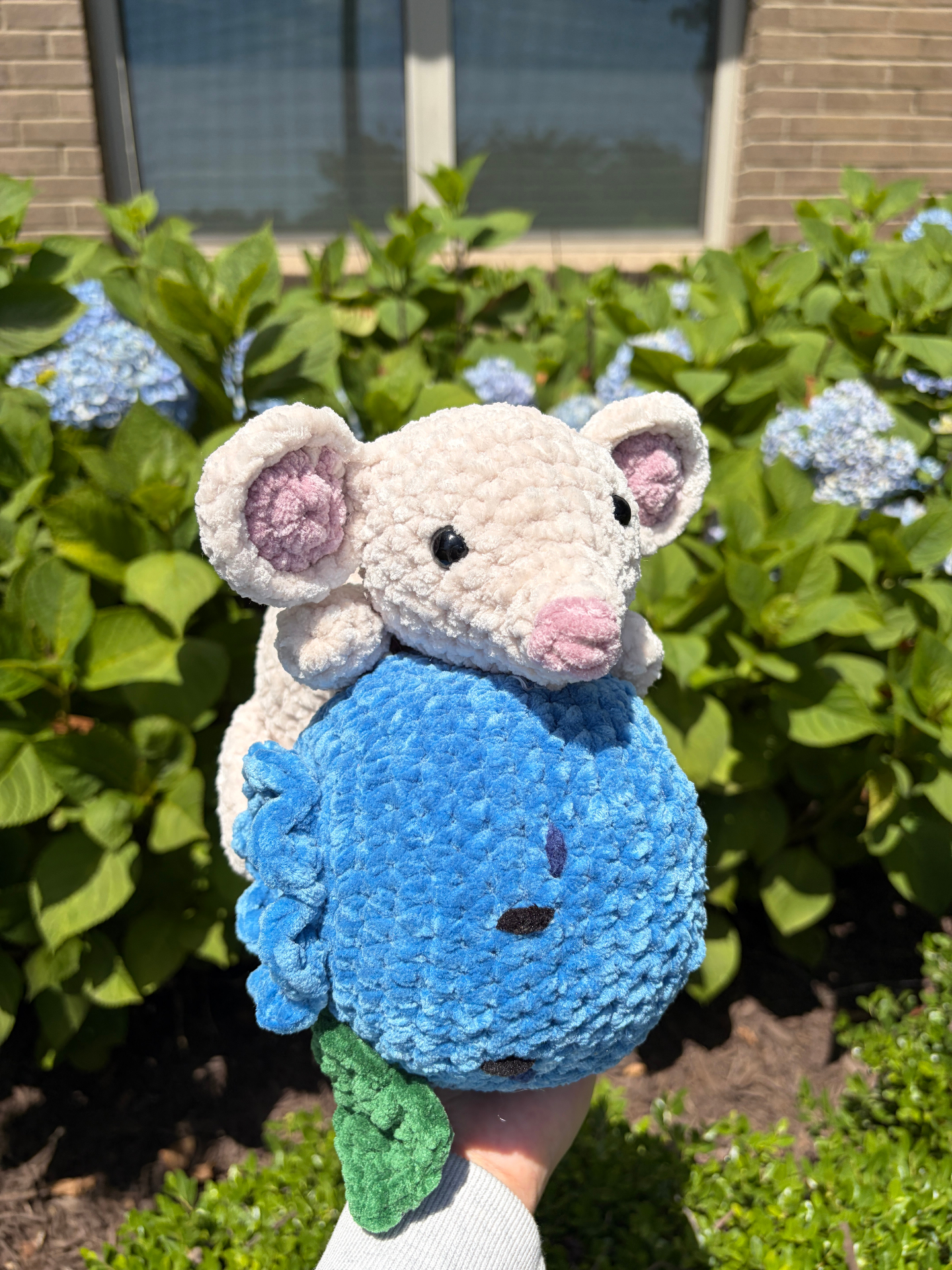 White crochet mouse with blueberry plushie